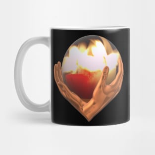 Ball with fire in the human hands Mug